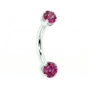 Dainty 2mm pink sapphire prong-set curved barbell in 14k white gold, 18 gauge, angled view