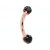 14k rose gold dainty 18G curved barbell with two 2mm round black diamonds, angled view