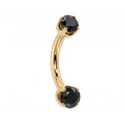 14k yellow gold dainty 18G curved barbell with two 2mm round black diamonds, angled view