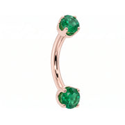 14k rose gold dainty 18G curved barbell with two 2mm round emeralds, angled view