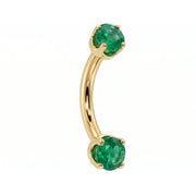 14k yellow gold dainty 18G curved barbell with two 2mm round emeralds, angled view