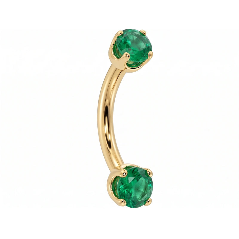 14k yellow gold dainty 18G curved barbell with two 2mm round emeralds, angled view