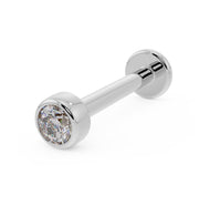 14k white gold 2mm CZ bezel-set flat back labret, angled front view on white background