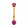 Dainty 2mm pink sapphire prong-set curved barbell in 14k yellow gold, 18 gauge, front view