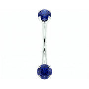 14k white gold dainty 18G curved barbell with two 2mm round blue sapphires, front view