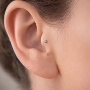 3.5mm diamond flat back labret shown in upper lobe piercing, close-up fit and scale view