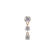 14K rose gold trinity drop labret stud with three cascading prong-set CZ stones, front view