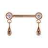 14k rose gold dew drop nipple barbell with CZ milgrain settings and warm-toned polished teardrop dangles