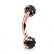14k rose gold curved barbell with two 4mm round black diamonds, angled view