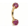 4mm pink sapphire prong-set curved barbell in 14k yellow gold, 16 gauge, angled view