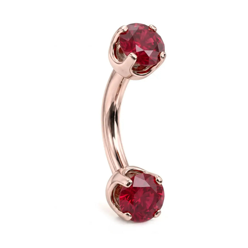 14k rose gold curved barbell with two 4mm round rubies, angled view