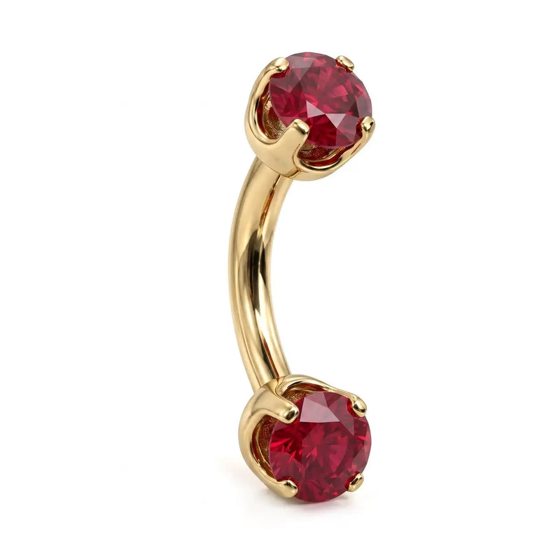 14k yellow gold curved barbell with two 4mm round rubies, angled view