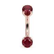 14k rose gold curved barbell with two 4mm round rubies, front view