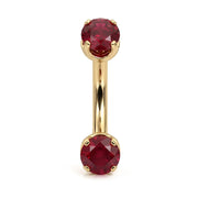 14k yellow gold curved barbell with two 4mm round rubies, front view