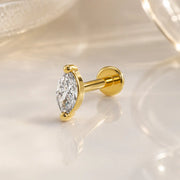 14k yellow gold marquise diamond flat back labret stud with 4-prong setting, angled lifestyle shot
