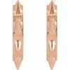 14k rose gold spike huggie hoops pair, close-up highlighting warm-toned angular spike detail