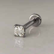 14k white gold 2mm Asscher-cut diamond flat back stud, angled shot on grey surface showing post and disc