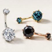 Astra II belly ring in four metal and gemstone combos: white gold moissanite, yellow gold blue topaz, rose gold onyx