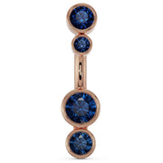 14k rose gold bubble bezel belly ring with four graduating blue sapphire stones, front view