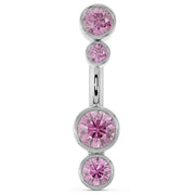 14k white gold bubble bezel belly ring with four graduating pink sapphire stones, front view