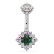 14k white gold halo navel ring with emerald center stone and diamond flower halo surround, front view