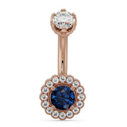 14k rose gold belly ring with blue sapphire center and diamond halo floral setting, front view