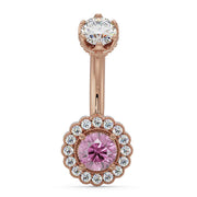 14k rose gold navel ring with pink sapphire center stone and diamond halo milgrain setting, front view