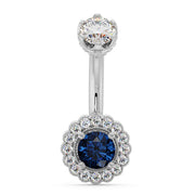 14k white gold navel ring with blue sapphire center and diamond halo floral setting, front view