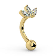 Side profile of 14k yellow gold lotus curved barbell showing marquise CZ cluster and curved shaft