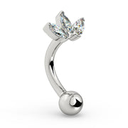Side profile of 14k white gold lotus curved barbell showing marquise CZ cluster and curved shaft