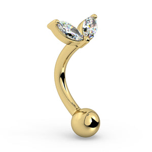 Angled side view of 14k yellow gold petals curved barbell showing CZ setting and curve