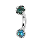 Reina London Blue Topaz Crown Curved Barbell in 14k white gold, side view - for navel, rook, or eyebrow piercings