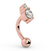 Angled side view of 14k rose gold rook barbell highlighting dual CZ setting and ball end