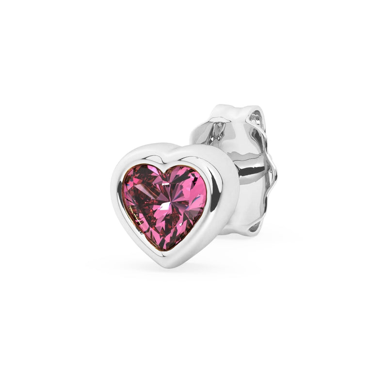 Single 14k white gold pink sapphire heart stud earring, angled view with bright pink bezel-set gemstone