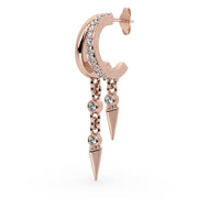 Side profile of 14K rose gold Vera diamond cuff earring showing pavé setting and dual spike chain drops