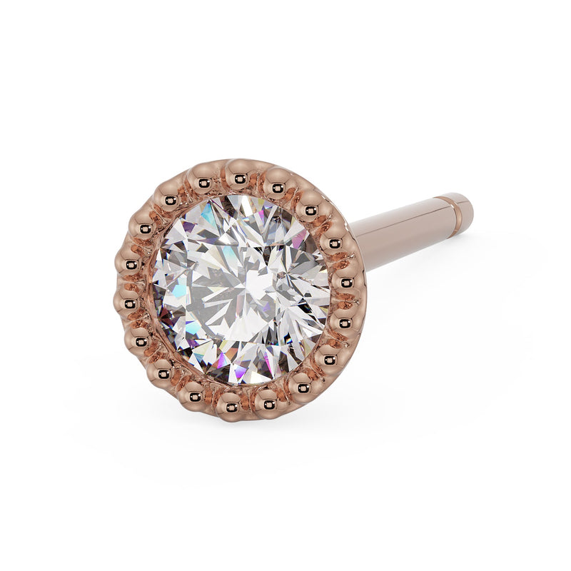 14K rose gold French milgrain stud earring with CZ, lower-right angle view showing bead border and post