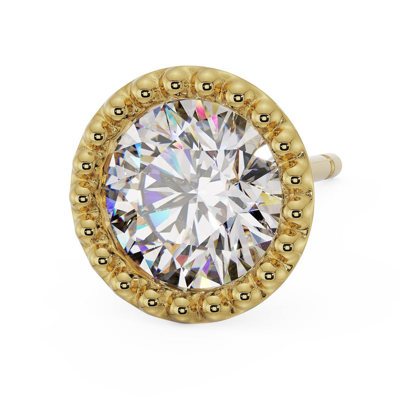 14K yellow gold milgrain stud earring, angled top view with CZ and beaded border from a slightly higher vantage