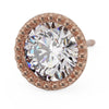 14K rose gold milgrain stud earring top-down angled view with brilliant CZ and complete beaded gold surround