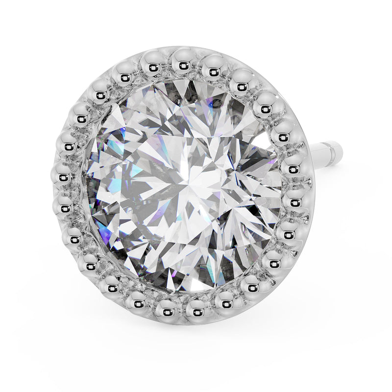 Top-angled view of 14K white gold milgrain stud earring with large CZ showing bright milgrain bead detail