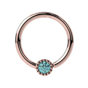 14k rose gold aqua diamond Perlagé fixed bead ring, front view showing warm tone against aqua-blue diamond