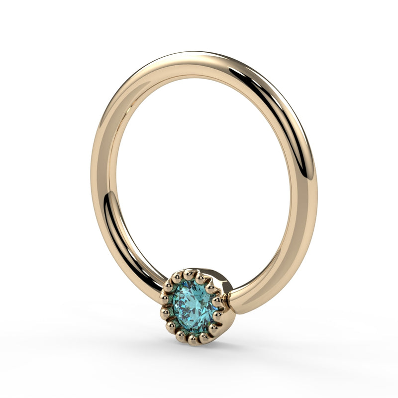 Side profile of 14k yellow gold aqua diamond Perlagé fixed bead ring showing hoop depth and bead detail