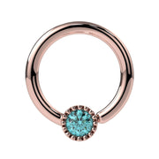 14k rose gold aqua diamond Perlagé fixed bead ring, slightly elevated front angle with aqua diamond centered