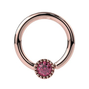 14k rose gold pink diamond Perlagé fixed bead ring, slightly angled front view showing milgrain setting