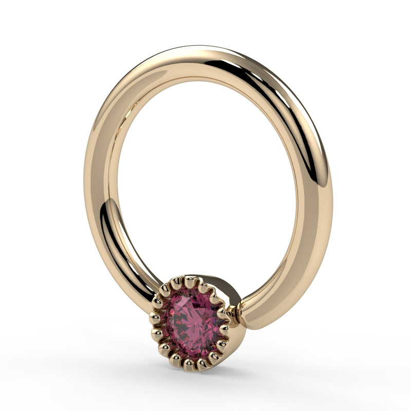 Side-angled view of 14k yellow gold pink diamond Perlagé ring showing milgrain bead setting profile