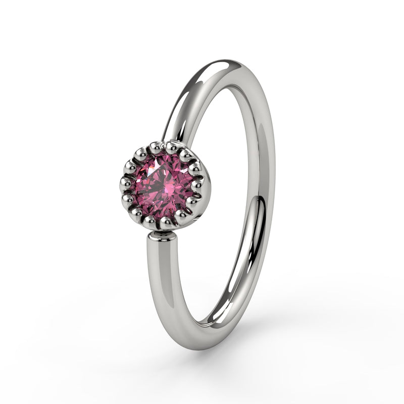 14k white gold pink diamond Perlagé fixed bead ring with beaded bezel, side-facing angled view