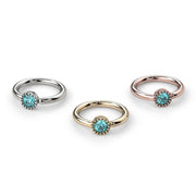 Three-color comparison of aqua diamond Perlagé fixed bead rings in white gold, yellow gold, rose gold