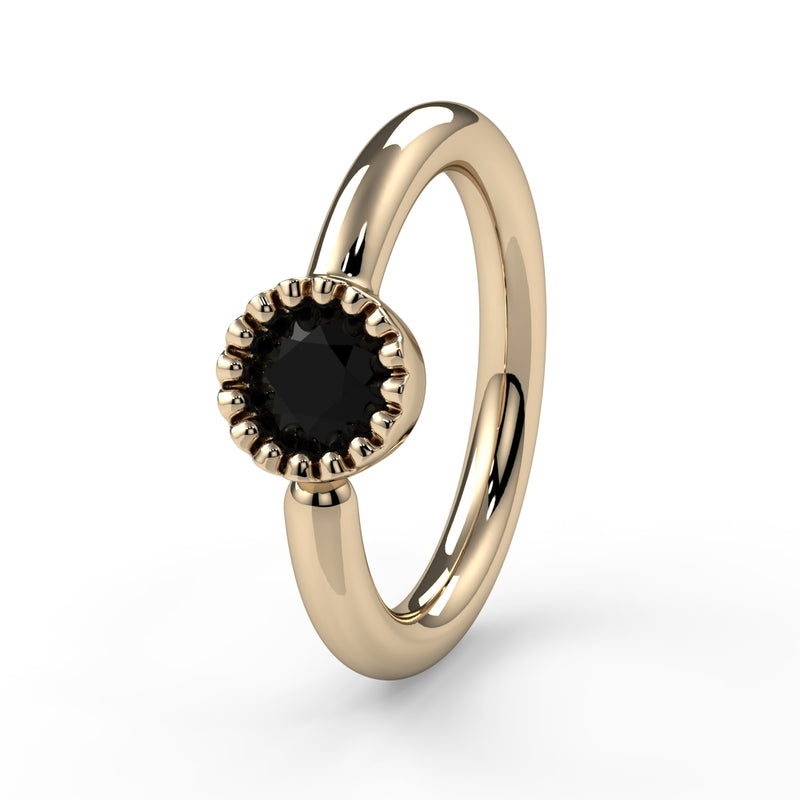 14k yellow gold black diamond fixed bead ring showing larger milgrain bezel detail, front angle view