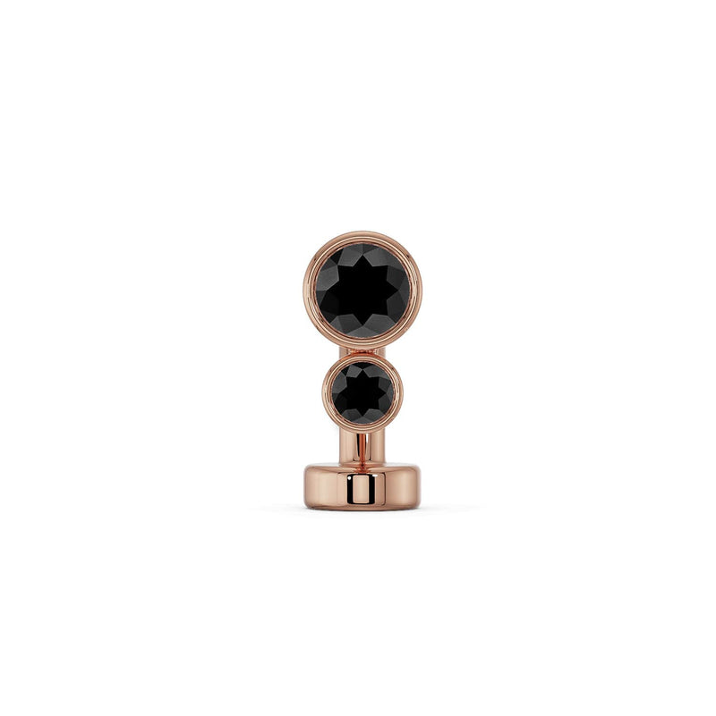 14k rose gold bubble bezel floating belly ring featuring two round black diamond stones, front view