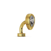 Side profile of 14k yellow gold CZ teardrop floating belly ring showing curved barbell shape