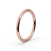 18K rose gold plain clicker ring hoop, angled view showing warm blush tone and clicker closure